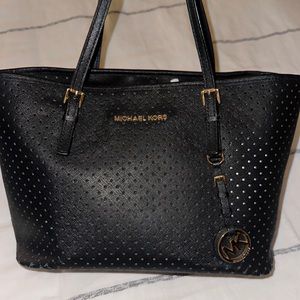 Michael Kors perforated black purse